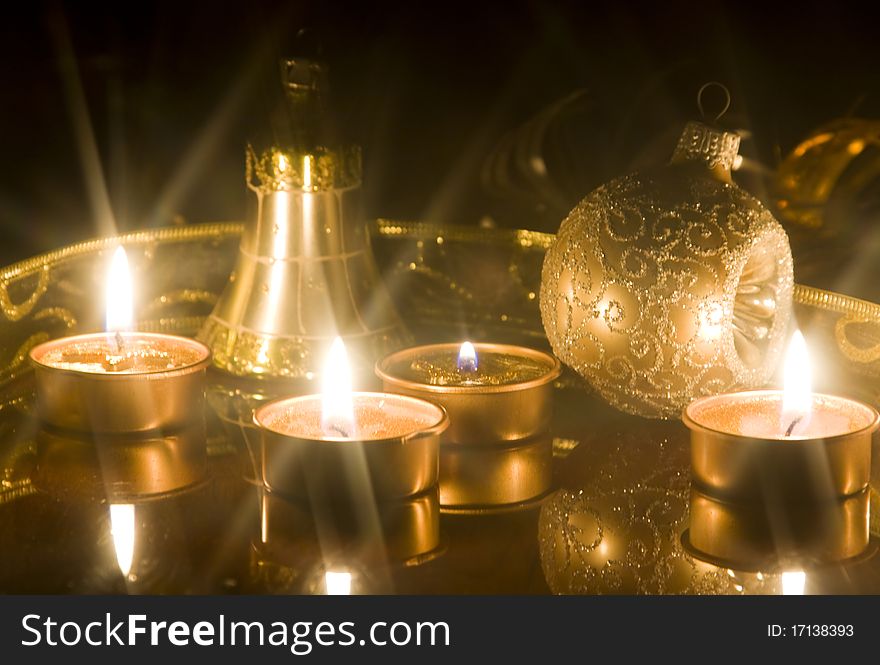 Christmas decorations and star shaped candles burning