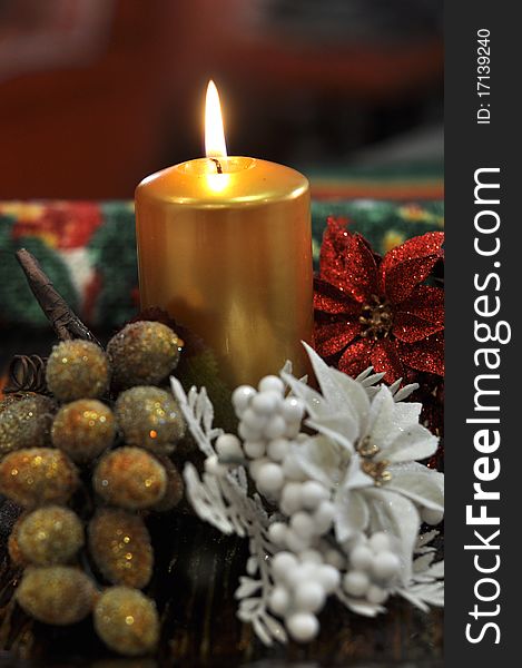 Golden candle and decorations for christmas. Golden candle and decorations for christmas