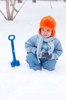 Free Little Boy Playing, Digs Snow 