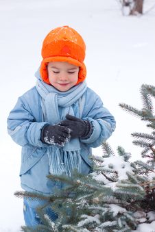 Little Boy Playing Snowballs Royalty Free Stock Images