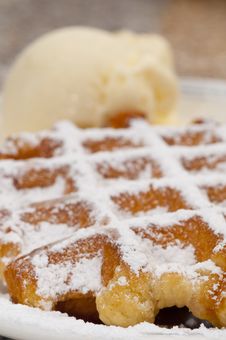 A Waffle With Sugar And Ice-cream Royalty Free Stock Photos