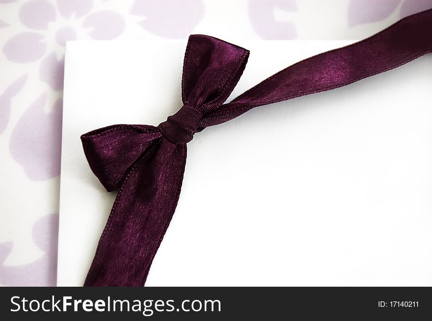 Gift card on holidays with violet bow. Gift card on holidays with violet bow