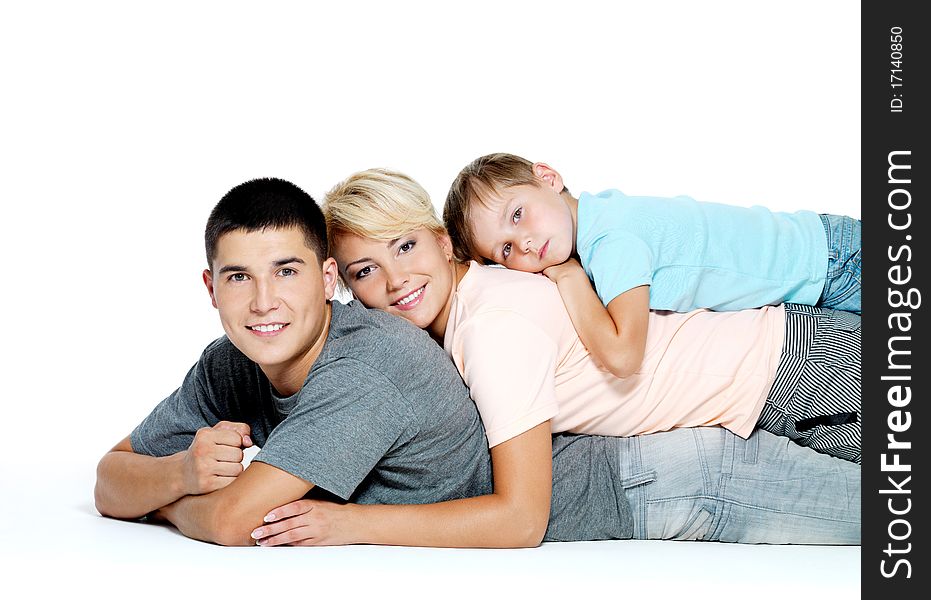 Happy youngl smiling family with little boy - isolated. Happy youngl smiling family with little boy - isolated