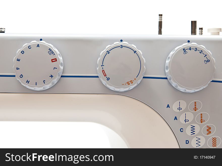 Details of sewing machine on white background. Details of sewing machine on white background