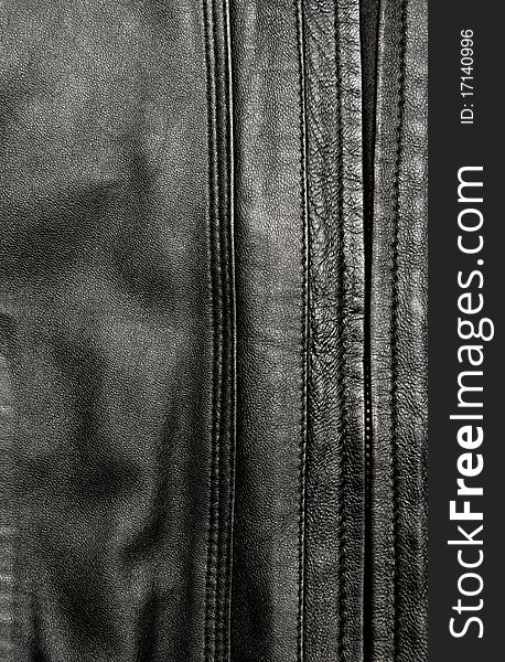 Ntural black leather texture. Studio shot