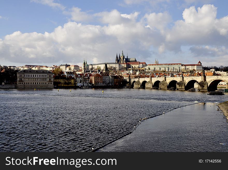 View from the waterfront to the Prague Castle and Charles Bridge