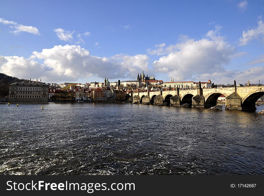 View from the waterfront to the Prague Castle and Charles Bridge