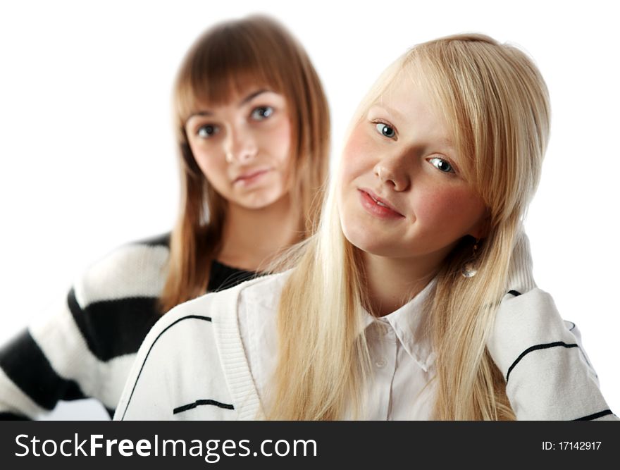 Portrait two girls small depth to sharpnesses on white background