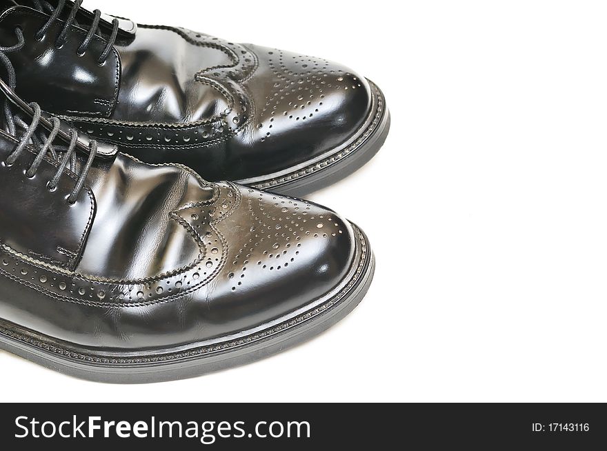Pair of men black leather shoes isolated. Pair of men black leather shoes isolated