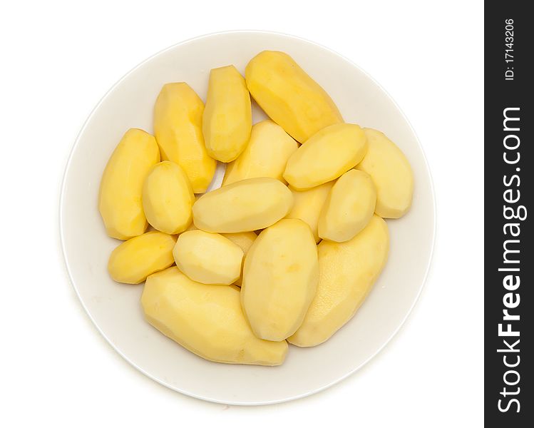 Purified crude potato on a plate on a white background