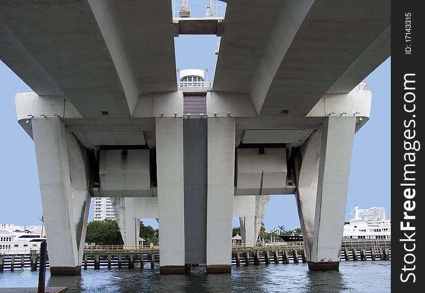 Under view looking up at Massive Draw Bridge connecting the Main Land to  Coastline of Fort Lauderdale. Under view looking up at Massive Draw Bridge connecting the Main Land to  Coastline of Fort Lauderdale