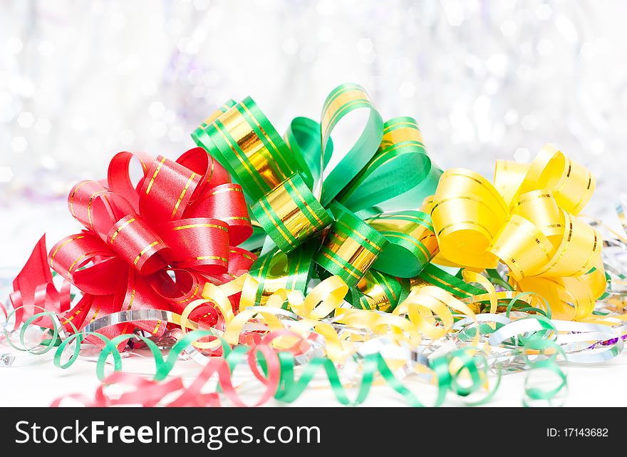 Christmas bright background with color ribbons. Christmas bright background with color ribbons