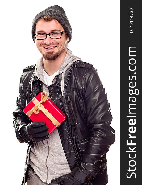 Warmly Dressed Handsome Young Man Holding Wrapped Gift Isolated on a White Background. Warmly Dressed Handsome Young Man Holding Wrapped Gift Isolated on a White Background.