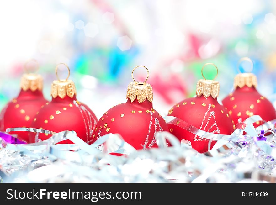 Color Christmas balls on bright background