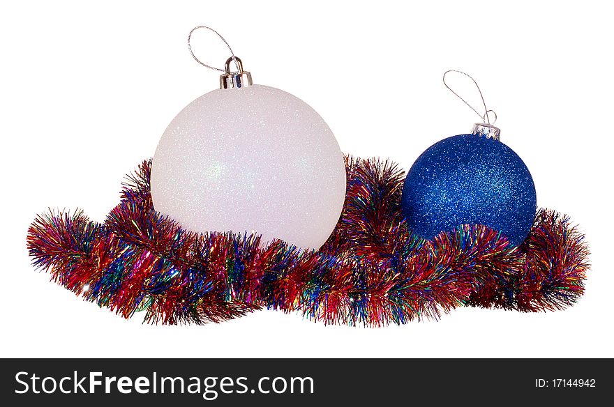 Christmas balls and colored tinsel on white background isolated