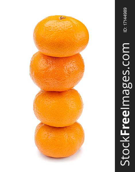 Row of four orange tangerines. Row of four orange tangerines