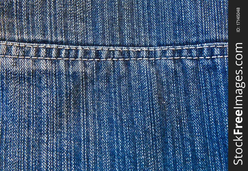 Rough seam on a blue denim