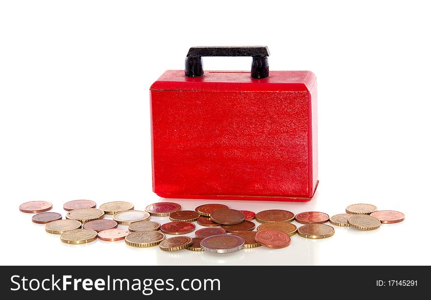 Euro coins in front of a briefcase isolated over white. Euro coins in front of a briefcase isolated over white