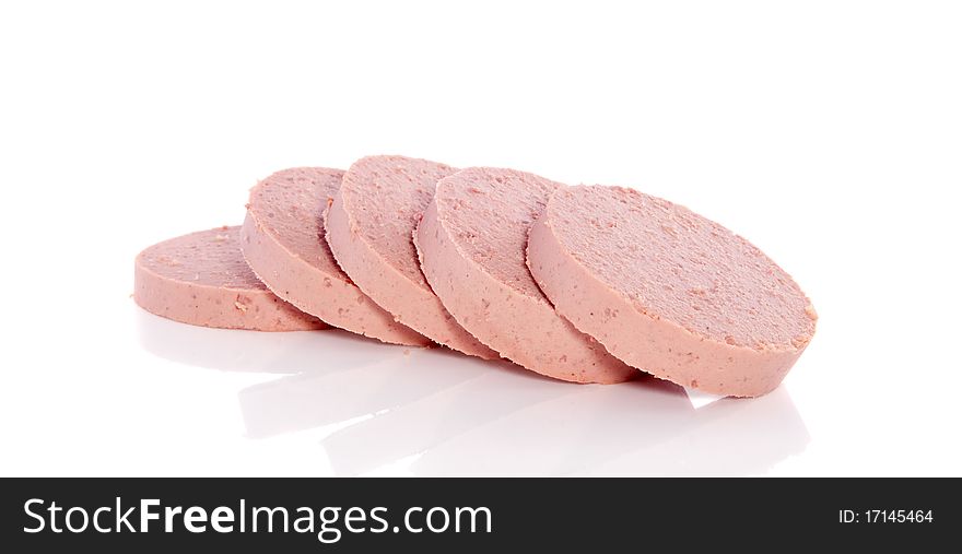 Slices liver sausage isolated over white