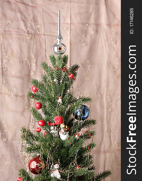 Christmas tree decoration at organdy background. Christmas tree decoration at organdy background