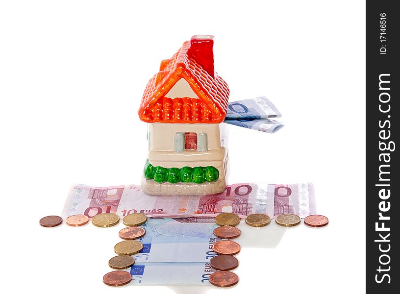 Little ceramic House as a money box isolated over white. Little ceramic House as a money box isolated over white