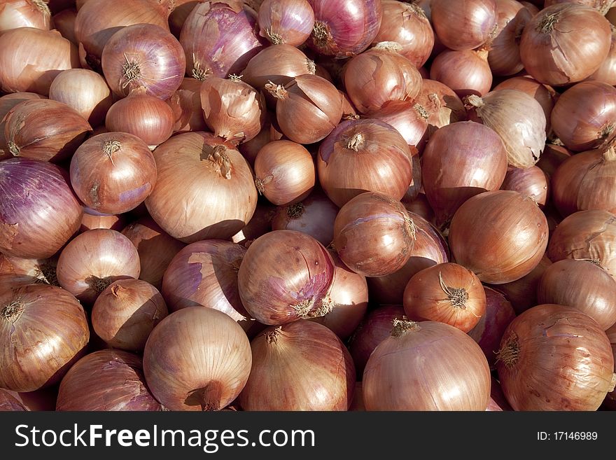 Onions on the counter of the vegetable market
