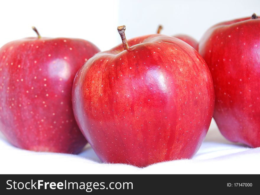 Red apples on white background top view. Red apples on white background top view