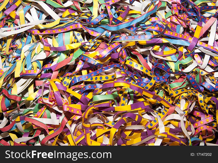 Many colored streamers on a table. Many colored streamers on a table