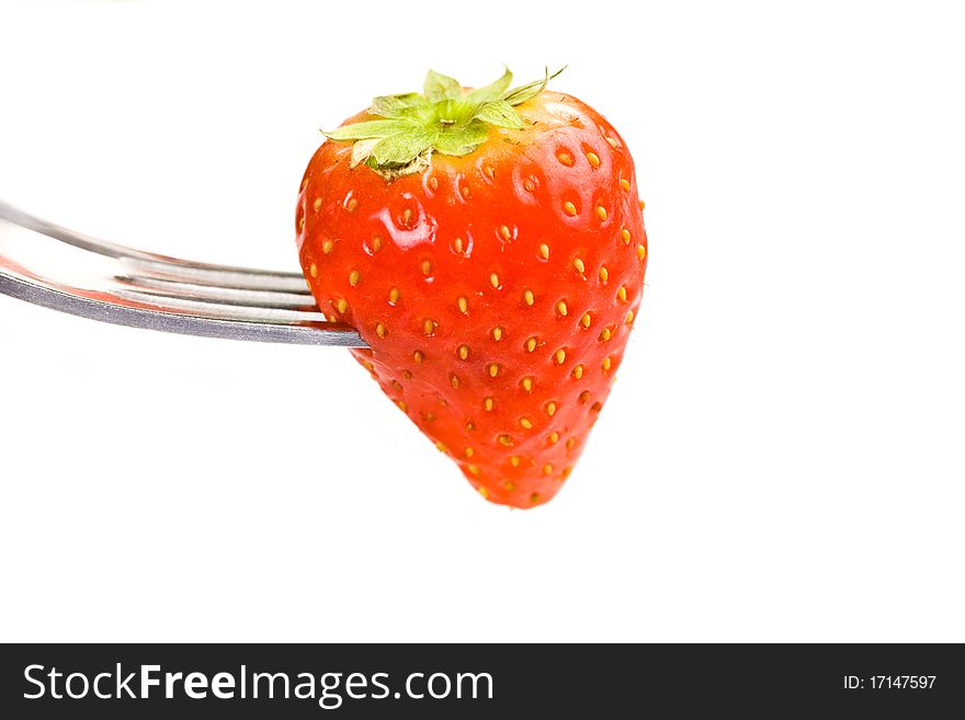 Photo of strawberries on green foils putted on white isolated background. Photo of strawberries on green foils putted on white isolated background