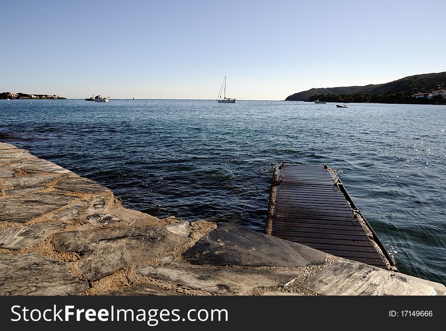 An image of a jetty on the coast of the Med, Spain. An image of a jetty on the coast of the Med, Spain.