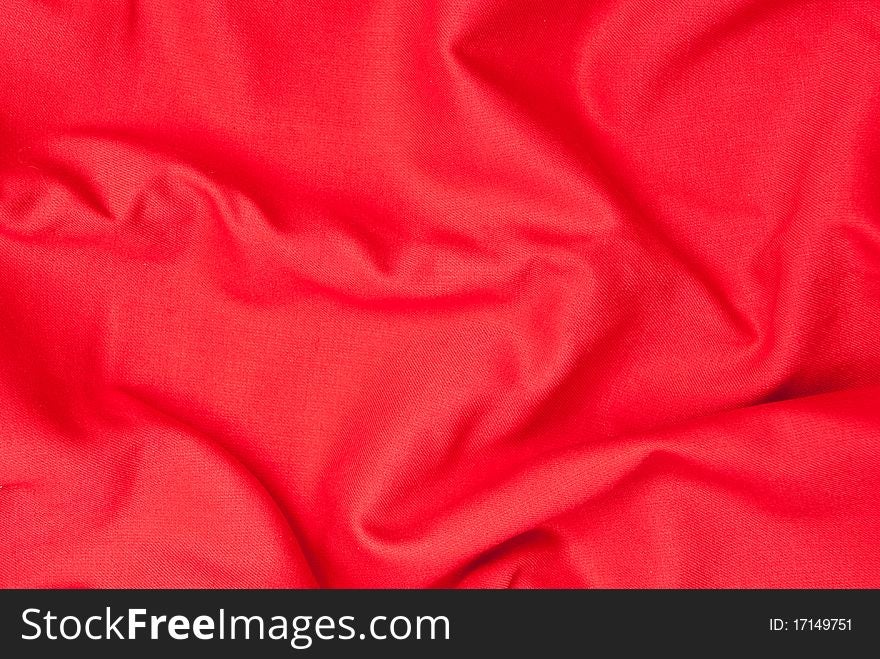 Shiny red textile background. Studio shot. Shiny red textile background. Studio shot