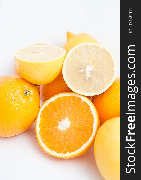 Group cut lemon and orange isolated on white background. Group cut lemon and orange isolated on white background