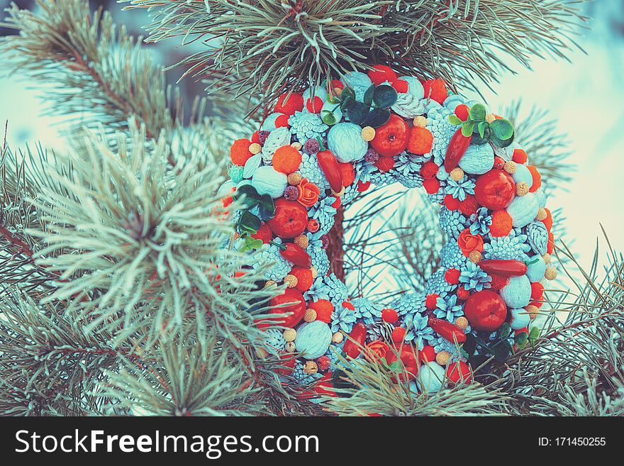 Pine branches and Christmas wreath background. Pine branches and Christmas wreath background