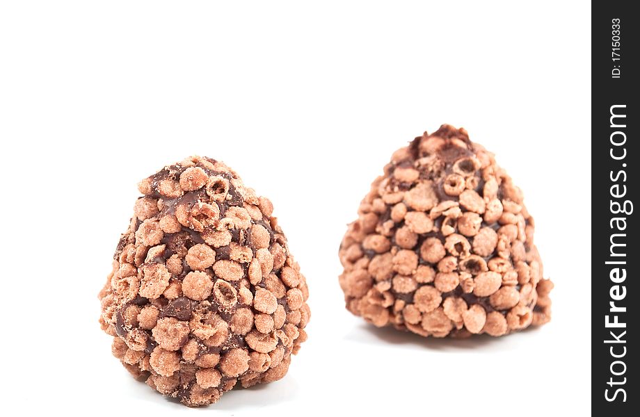 Chocolate truffles on a white background