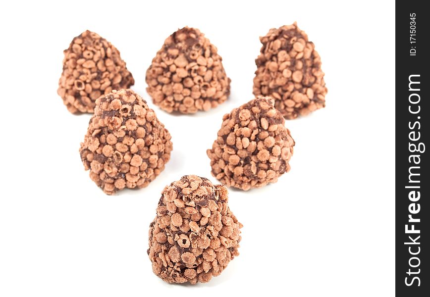 Chocolate truffles on a white background