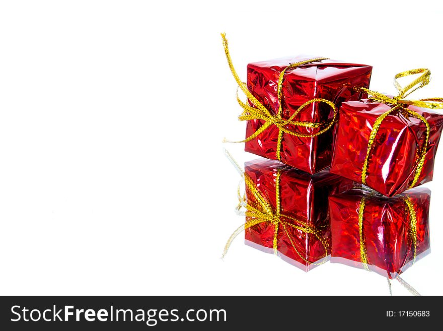 Red gift boxes with reflection. Red gift boxes with reflection