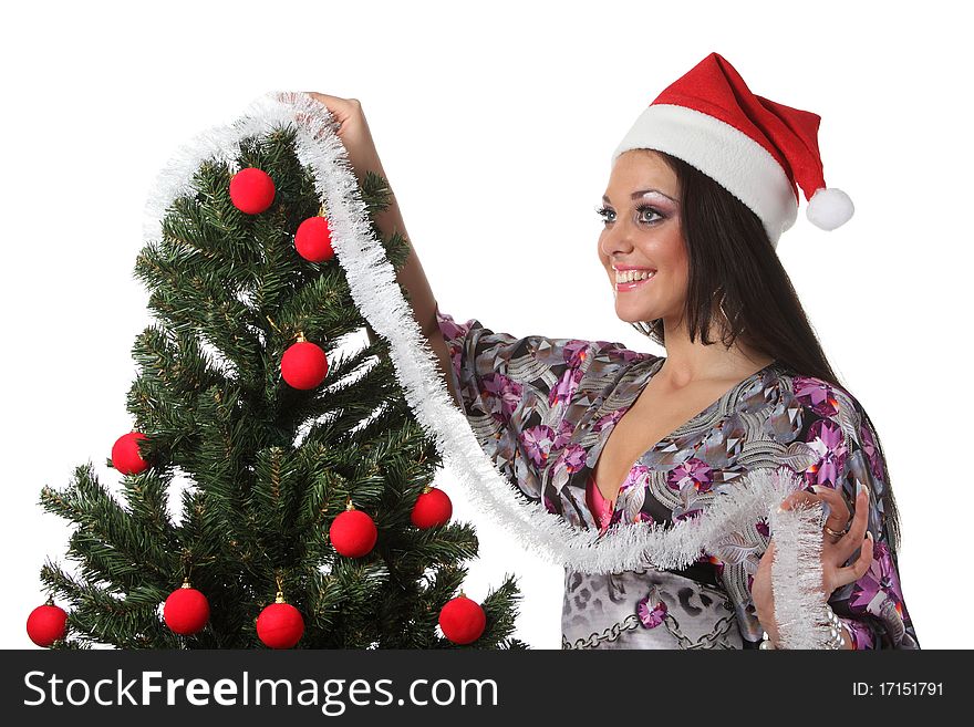 Woman decorate a christmas tree