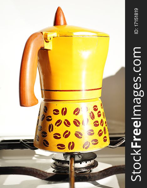 A yellow coffee machine espresso moka. A yellow coffee machine espresso moka