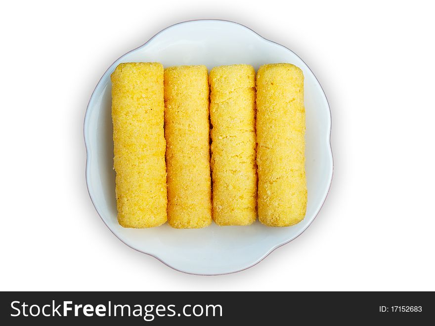 Yellow snack made by corn on white background. Yellow snack made by corn on white background.
