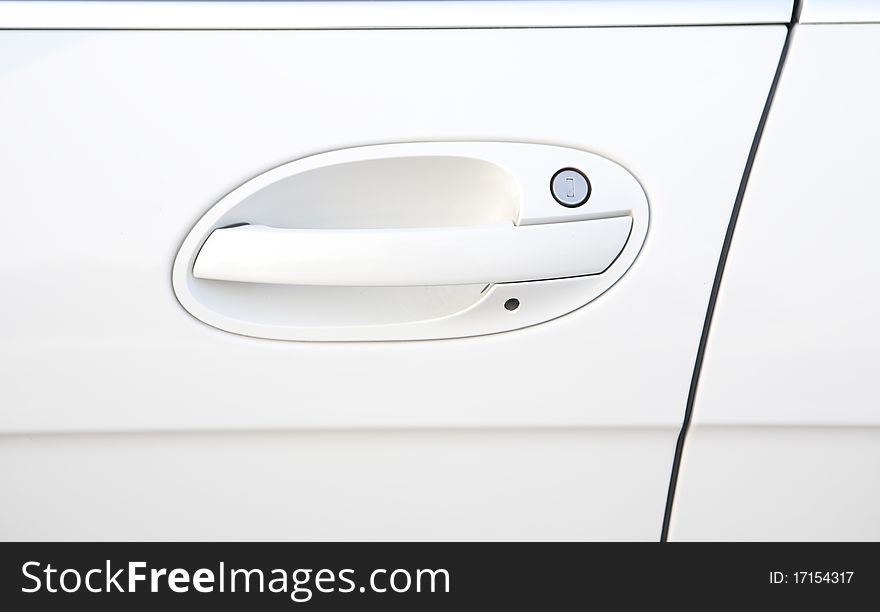 White door of a car with handle. White door of a car with handle