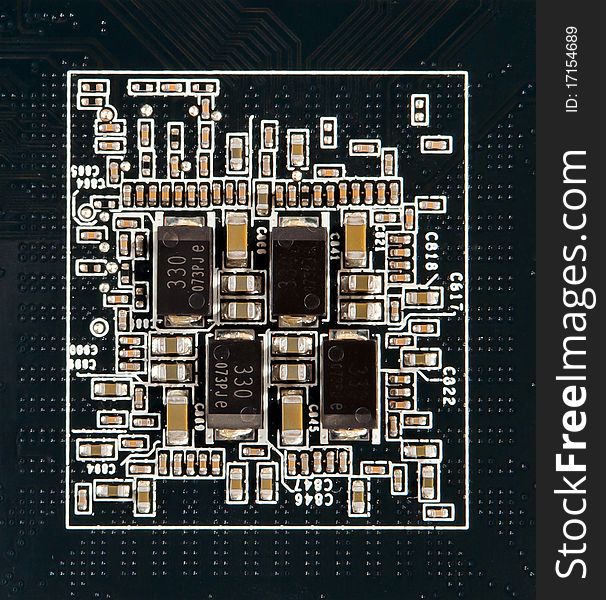 Small semiconductor components on a black background. Small semiconductor components on a black background