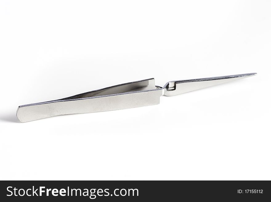 Tweezers isolated on a white background. Tweezers isolated on a white background.