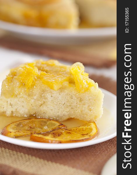 Cake with oranges in caramel sauce