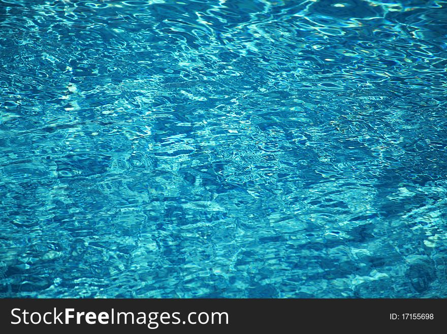 Swimming pool water reflections. Daylight. Swimming pool water reflections. Daylight.