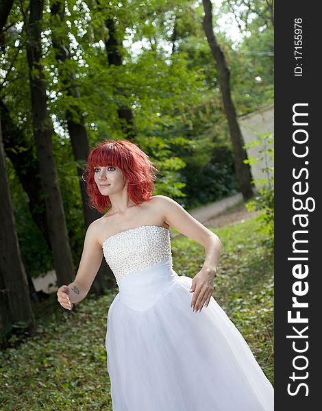 Pretty woman posing in forest. Pretty woman posing in forest