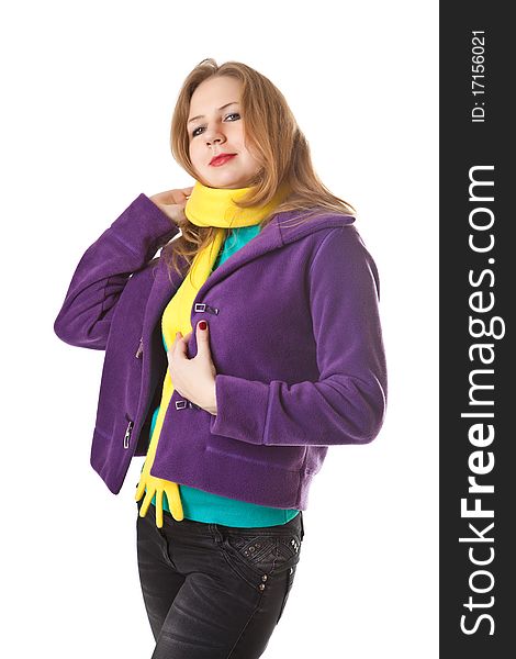 Girl in a purple jacket with a yellow scarf isolated on a white background