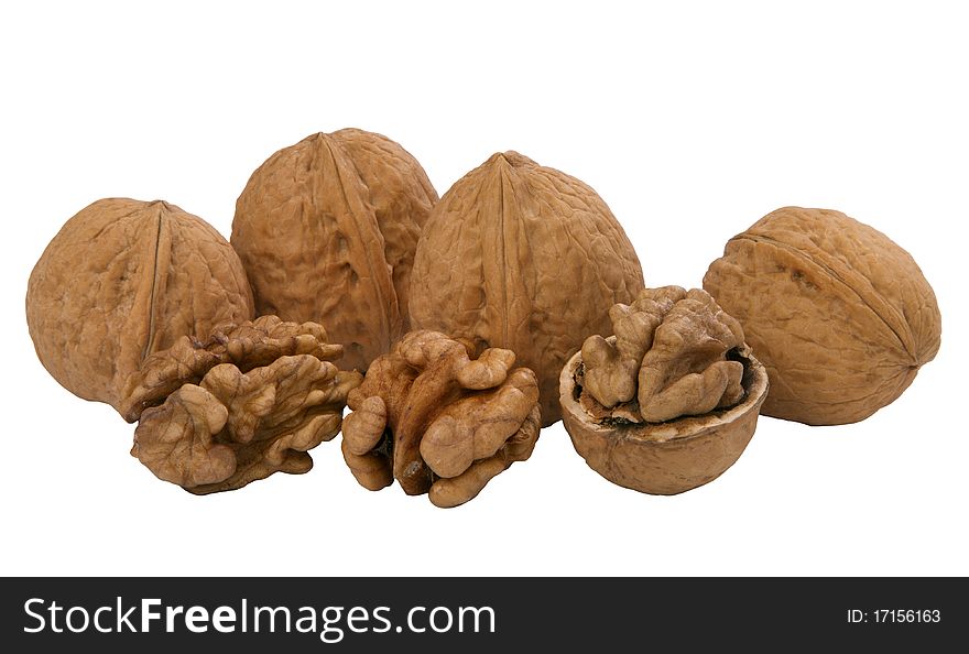 Walnuts, whole and unshelled, isolated on white.