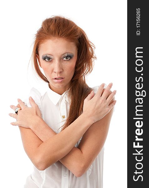 Young redhead woman on a white background