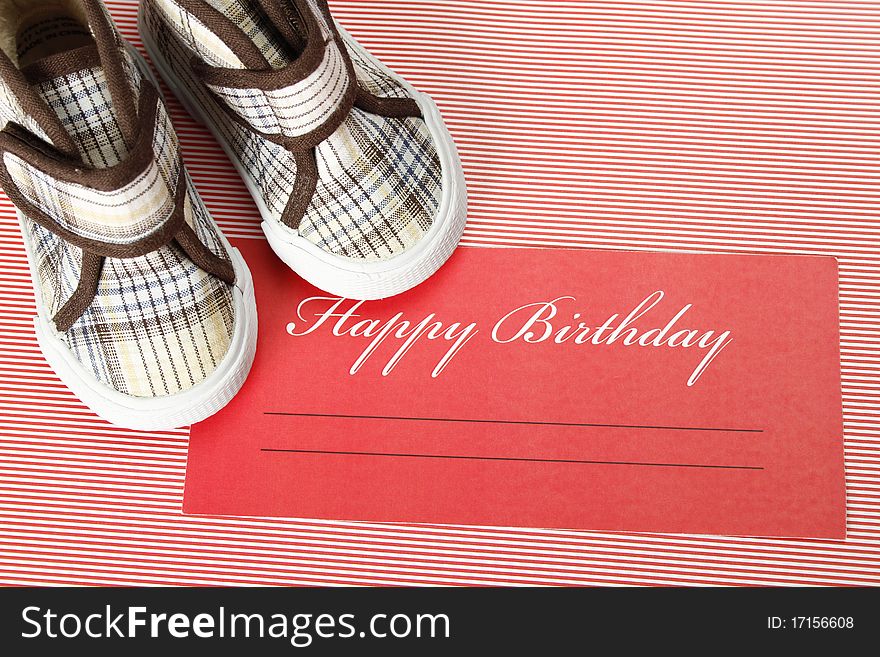 Postcard with birthday greetings and a number of shoes for your child. Postcard with birthday greetings and a number of shoes for your child