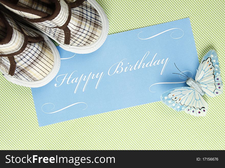 Postcard with birthday greetings and a number of shoes for your child. Postcard with birthday greetings and a number of shoes for your child